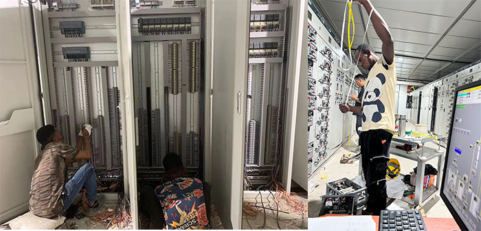 葡京线路检测3522工程师指导当地工人安装DCS系统控制柜.jpg